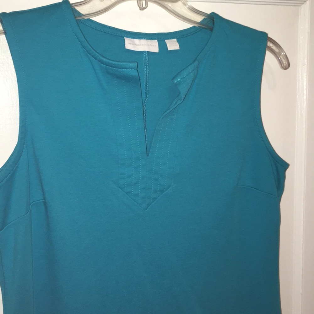 Sleeveless shift dress.